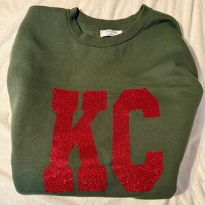 Green Sweatshirt with Red Glitter KC Letters